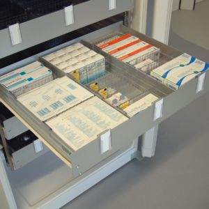 Block of aluminium drawers with dividers and label holders